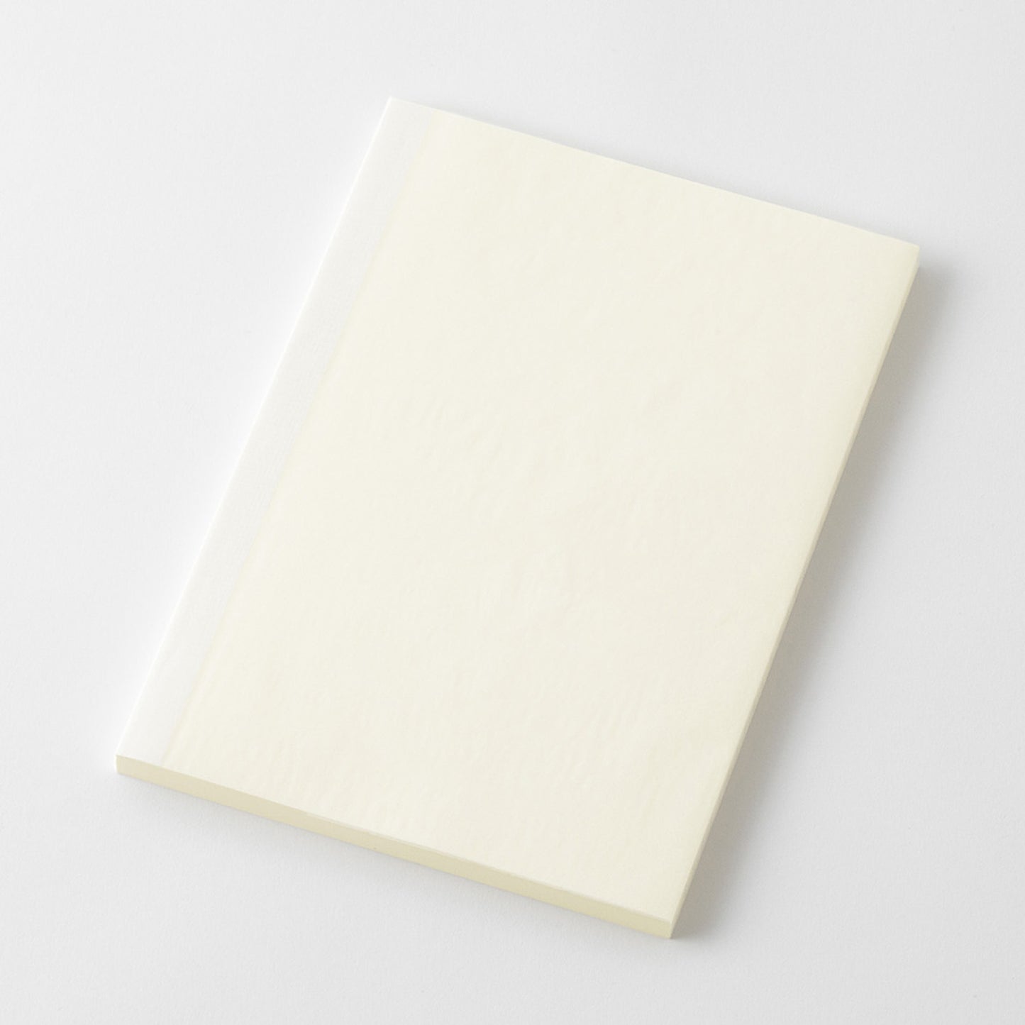 MD Product A5 blank notebook with a protective glassine cover.