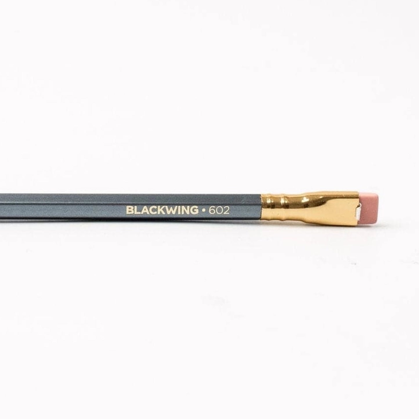 The iconic blackwing 602 pencil with a gunmetal gray finish, gold ferrule and square pink eraser.