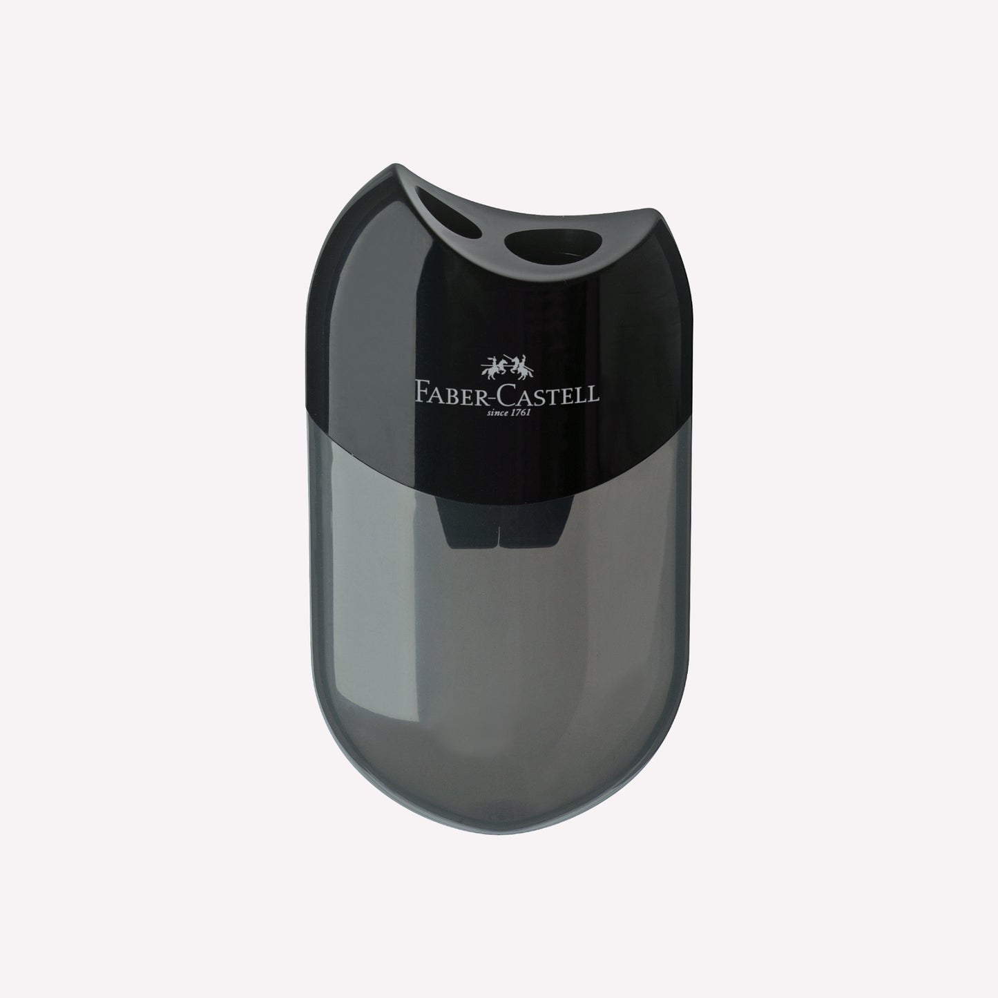 Black double hole pencil sharpener made by Faber-Castell with a case to contain waste pencil shavings.