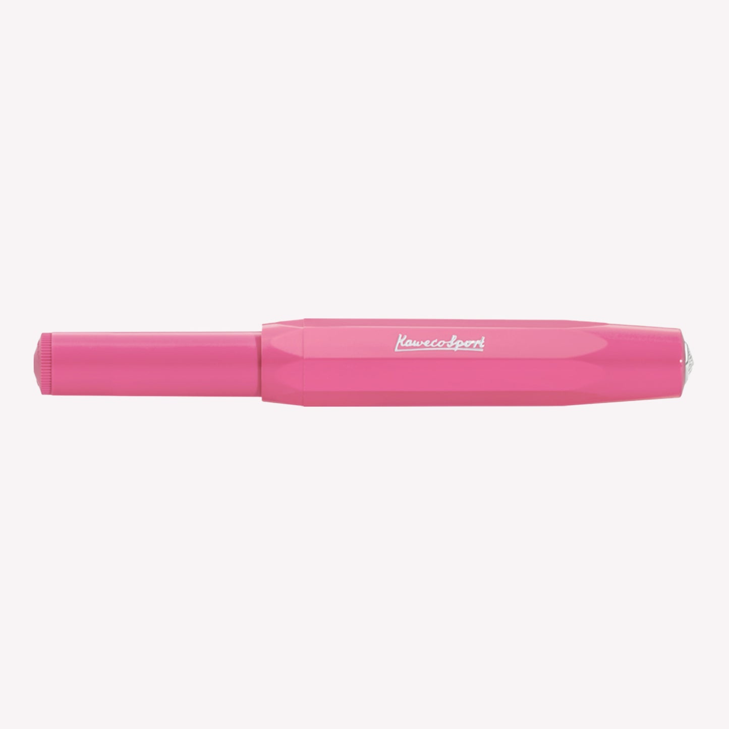Kaweco Skyline Sport fountain pen with the lid on, featuring a bright pink barrel and silver logo details.