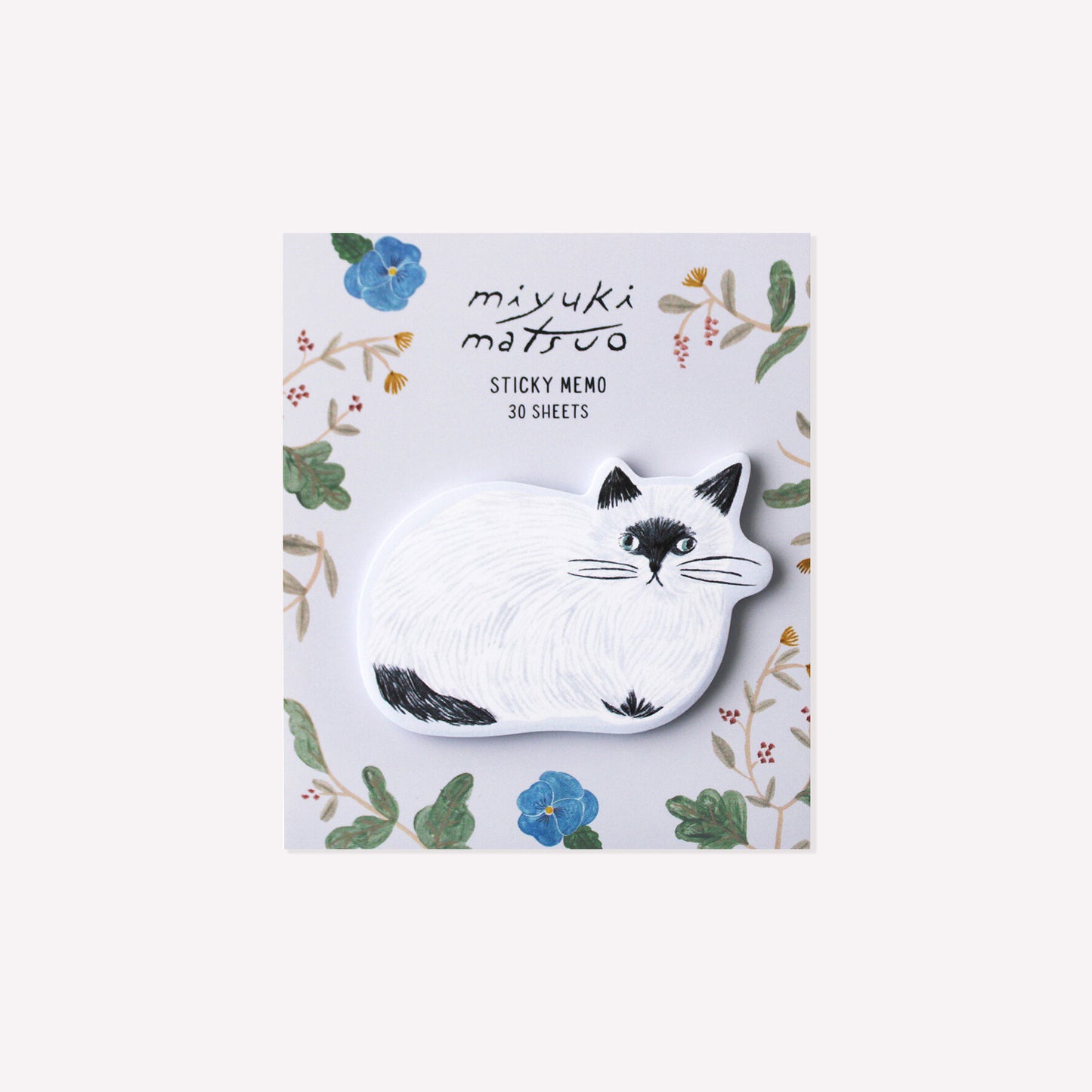 Repos cat shaped die cut sticky memo pad presented on a purple floral background.
