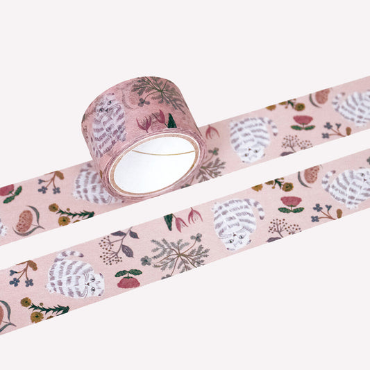 Miyuki Matsuo roll and swatch of masking tape with floral and "Amy" cat design on a on a pink background.