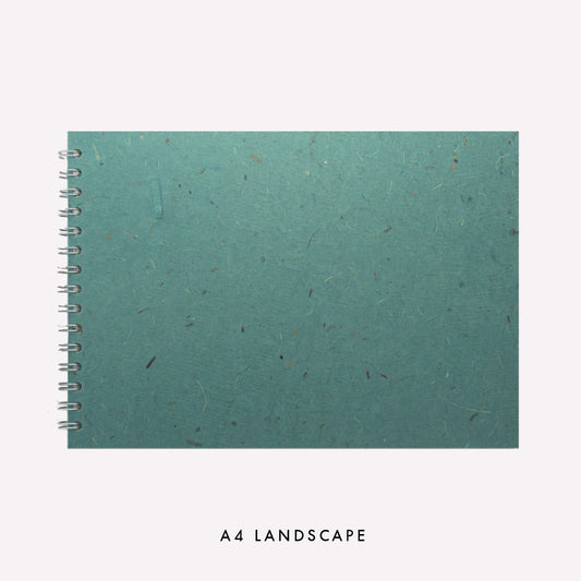 A4 landscape watercolour sketchbooks made in the UK by Pink Pig, with turquoise banana tissue covers, wire binding, and 15 bockingford watercolour pages.
