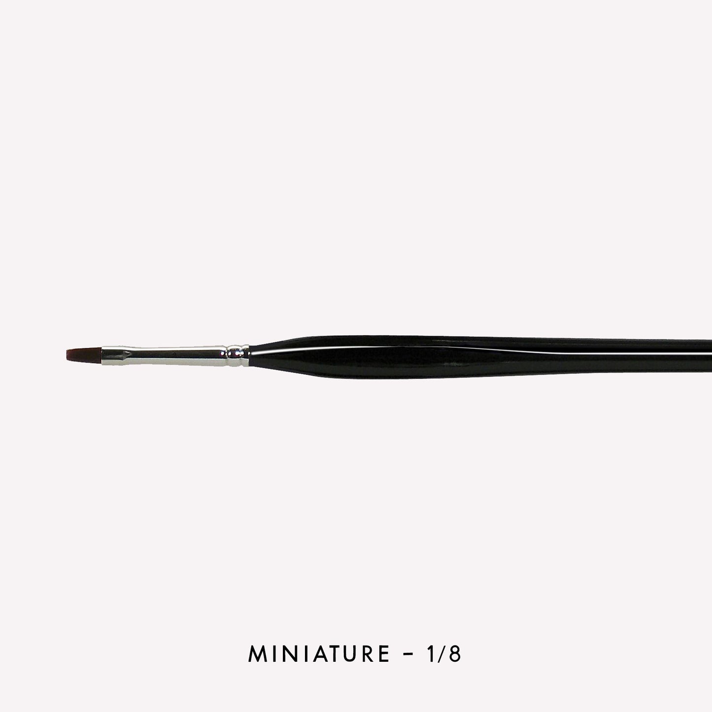 Pro Arte miniature synthetic paint in size 1/8, featuring flat bristles ideal for model making or colour blocking. The triangular handle offers a comfortable grip and precision whilst working.