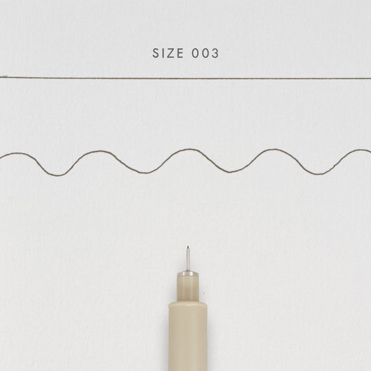 Swatch of the Sakura Micron FIneliner in size 003 showing a fine 0.15mm black line.