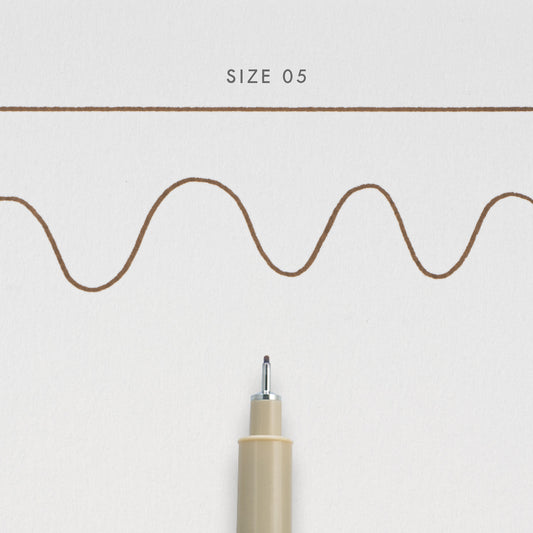 Swatch of the Sakura Micron FIneliner in size 05 showing a fine 0.45mm black line.