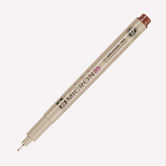 Sakura Micron Fineliner in size 05 with archival ink that draws a 0.45mm sepia.