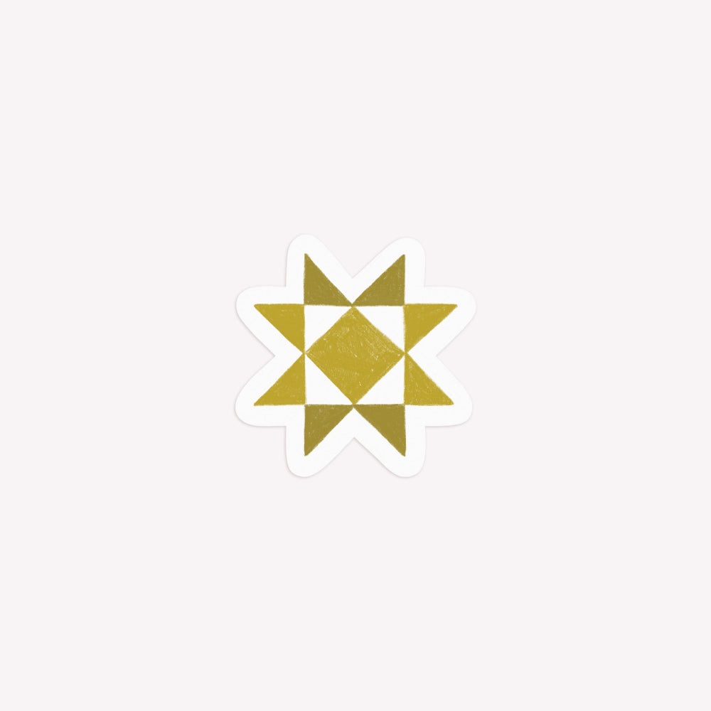 Illustrated, die-cut paper sticker of a green sawtooth star.
