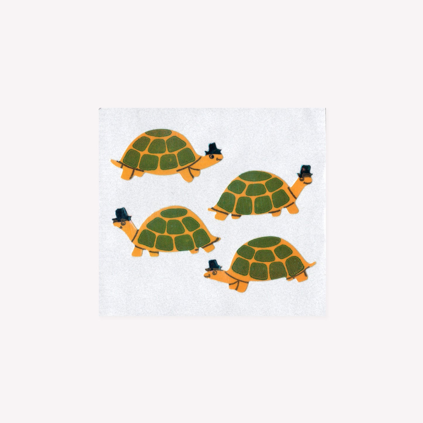 Four pearlie vintage stickers of tortoises wearing top hats, on a mini sticker sheet from Stickermagic