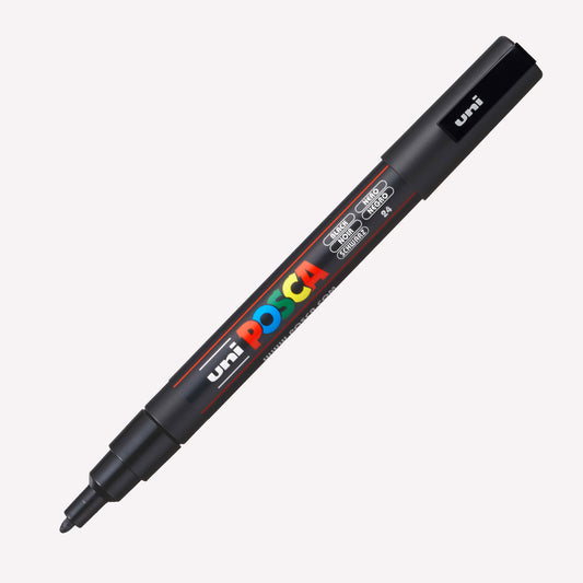 Uni Posca 3m Paint Marker in black with a an open lid showing the fine 1.3mm nib.