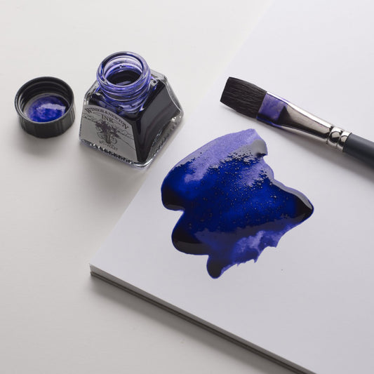 Sample paper of Winsor & Newton's Artist Bristol Paper A4 pad. Extra smooth with an open ink bottle and violet ink swatch.