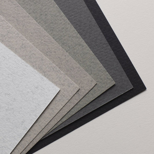 Winsor and Newton A4 grey toned paper for pastel, charcoal and chalk drawing. Paper is textured on one side and smooth on the reverse.