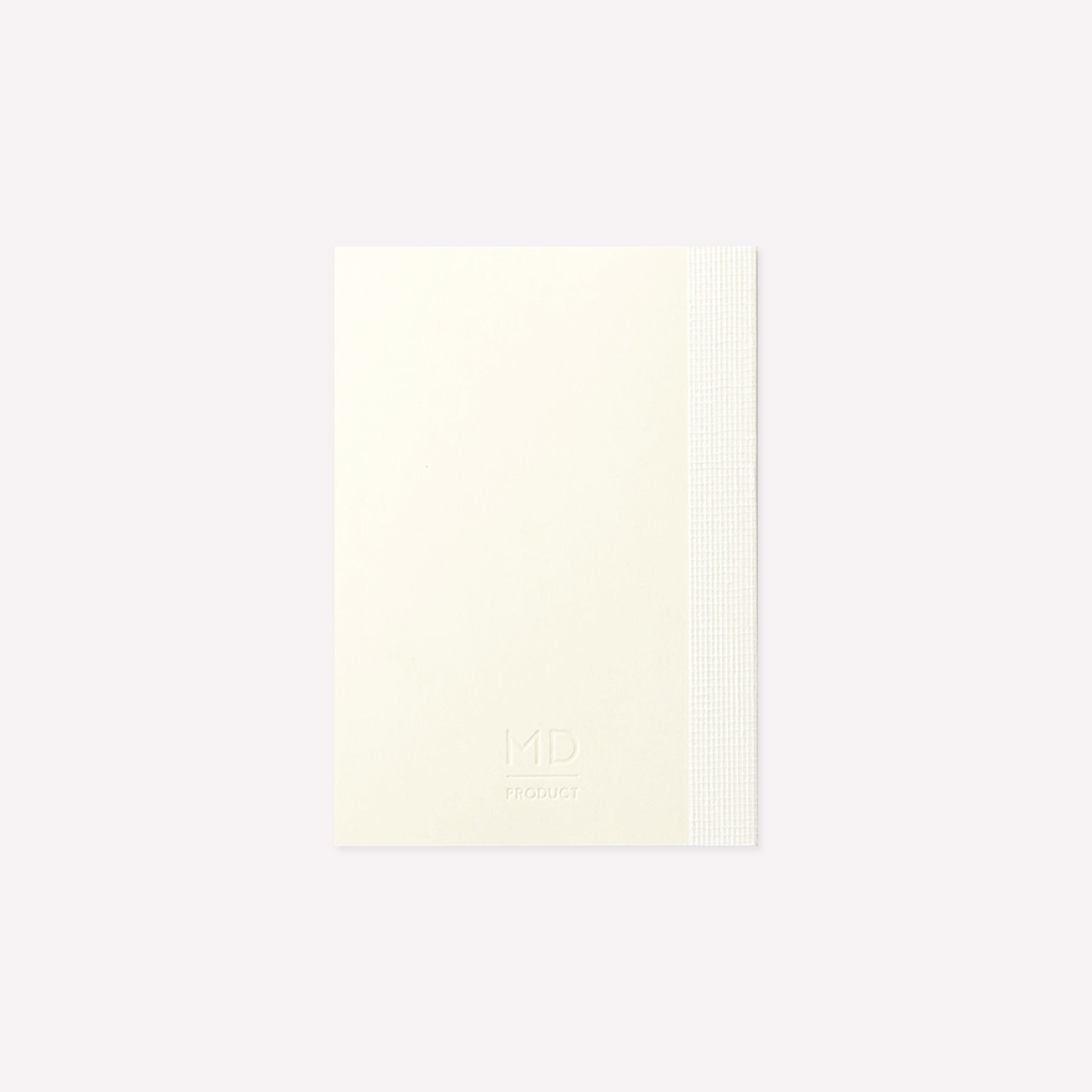 MD Product A7 Notebook with a minimalist cream cover and the MD Product logo embossed on the back cover. 