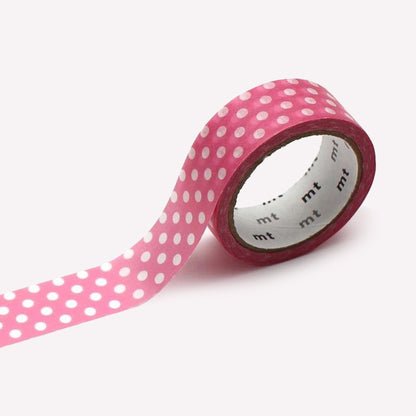 Roll of MT Washi Aurora Pink tape with a pattern of white polkadots. 