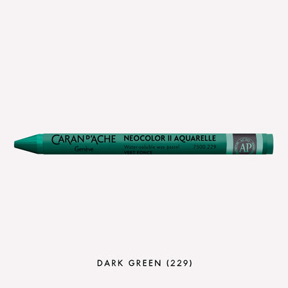 Caran d'Ache Neocolor II Aquarelle water-soluble wax pastel in Dark Green (229) on a white background. 
