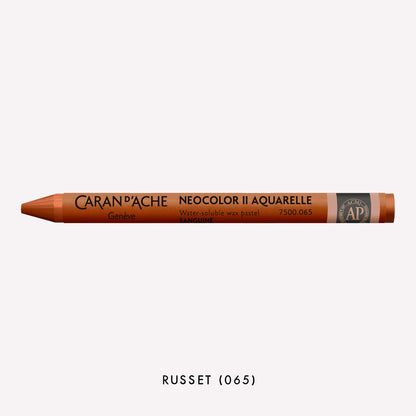 Caran d'Ache Neocolor II Aquarelle water-soluble wax pastel in Russet (065) on a white background. 