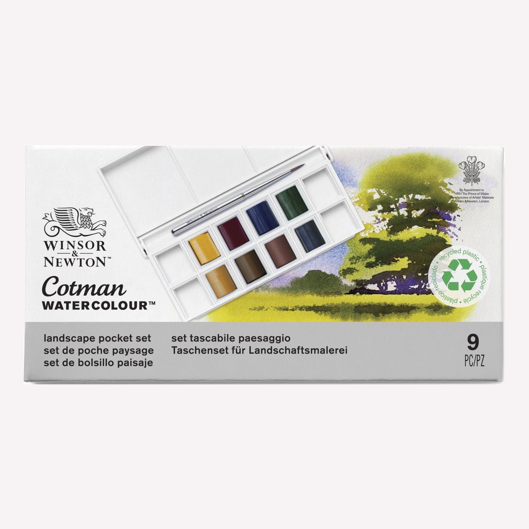 Cotman Watercolour Landscape pocket set, presented in packaging that shows the 8 half pans included, alongside examples of a landscape painting you can create using this set.