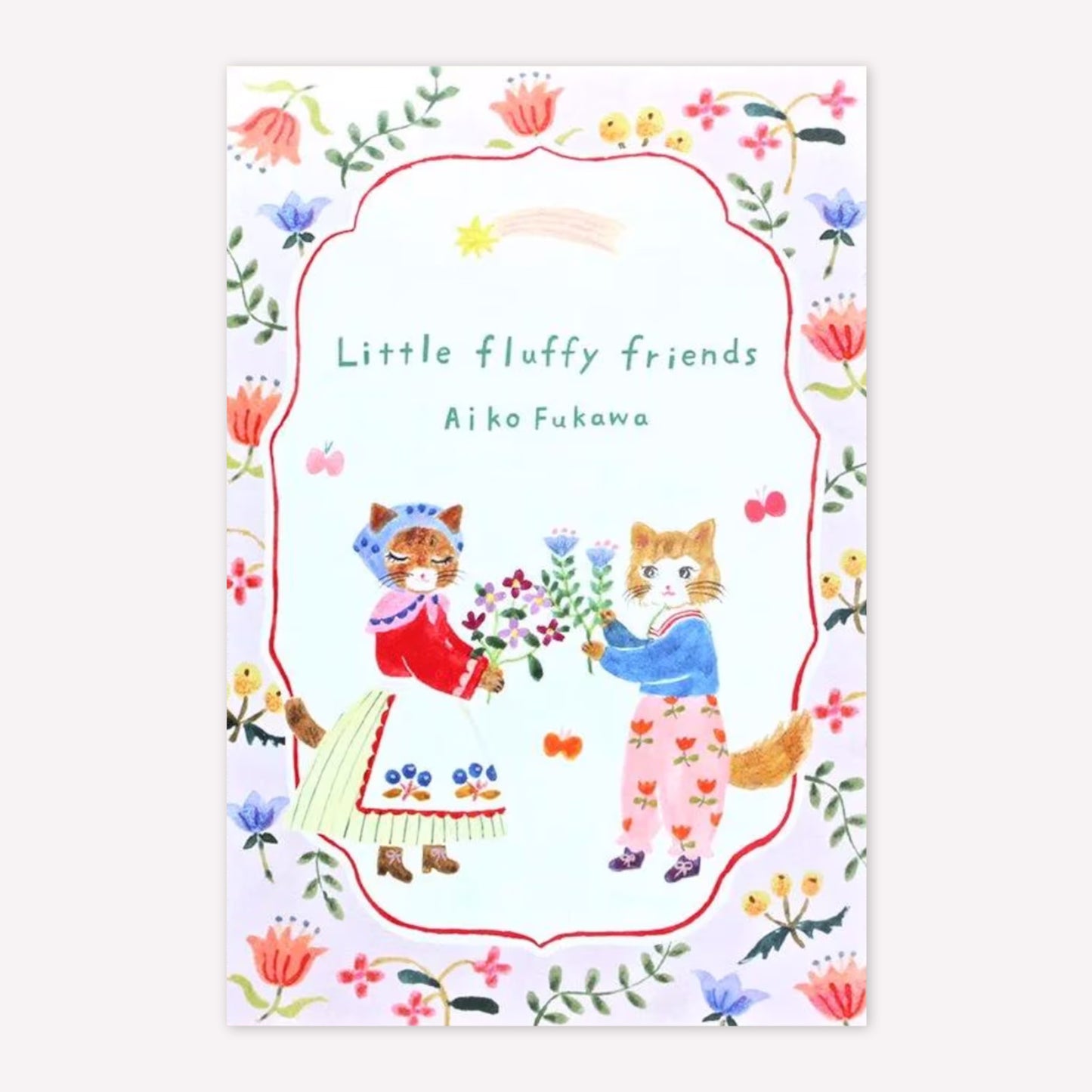 Front cover of Cozyca Aiko Fukawa postcard pad set with an illustration of two cats holding flowers within a pink floral border. 