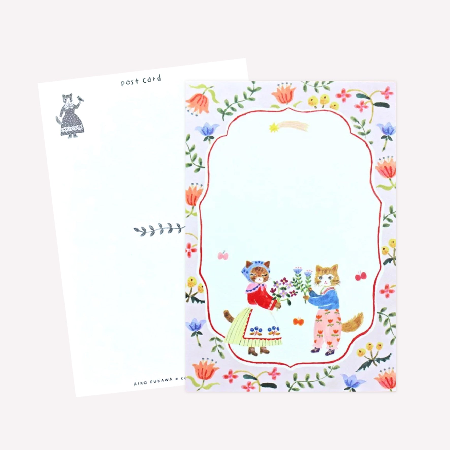 Cozyca Aiko Fukawa postcard design featuring two cats dressed in cute outfits holding bouquets of flowers within a floral border. The revers features a postcard design with space to write a message. 