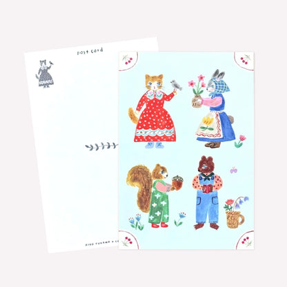 Cozyca Aiko Fukawa postcard design featuring four animals dressed in cute outfits holding bouquets of flowers. The revers features a postcard design with space to write a message. 
