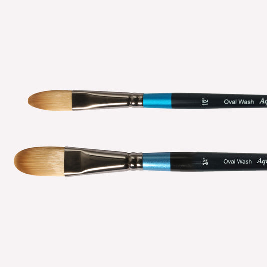 Daler Rowney Aquafine Oval Wash paintbrush series featuring brushes sized 1/2”, and 3/4” . Brushes have a classy black handle with blue detailing and a silver ferrule.