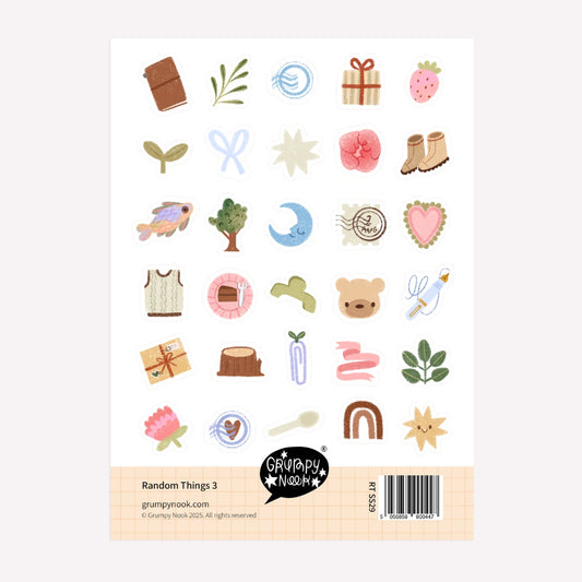 A6 sticker sheet with 30 cute sticker designs including a bear, stamps, leaves, stars and a moon. Designed by Grumpy Nook. 