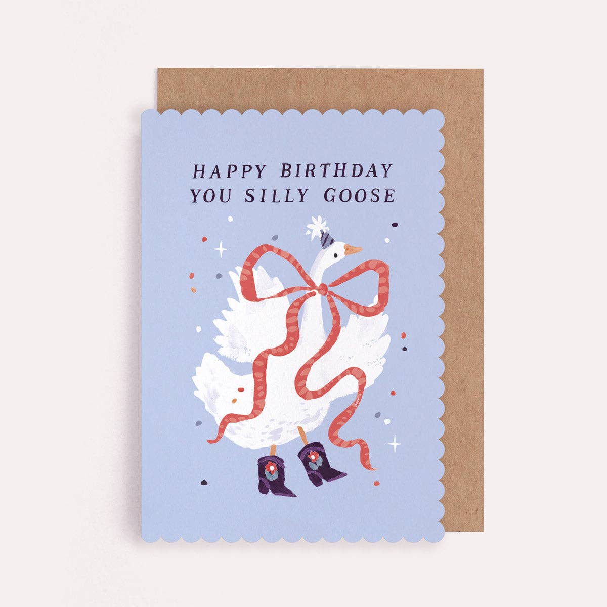 A birthday greetings card by Sister Paper Co with an illustration of a goose and text that reads "Happy Birthday You Silly Goose".