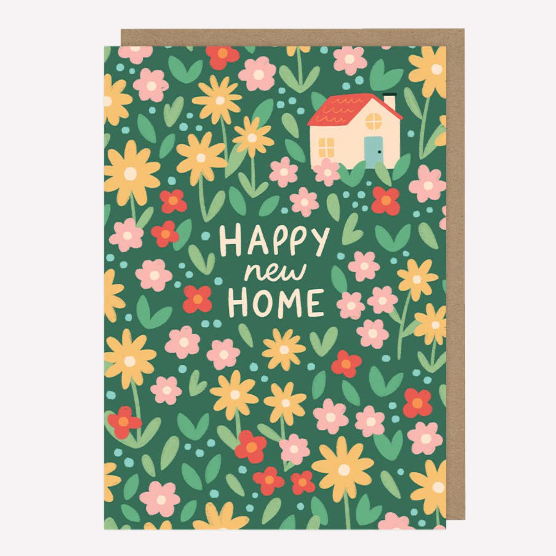 Illustrated greetings card featuring flowers and a little house on a green background with handwritten text reading "happy new home". 