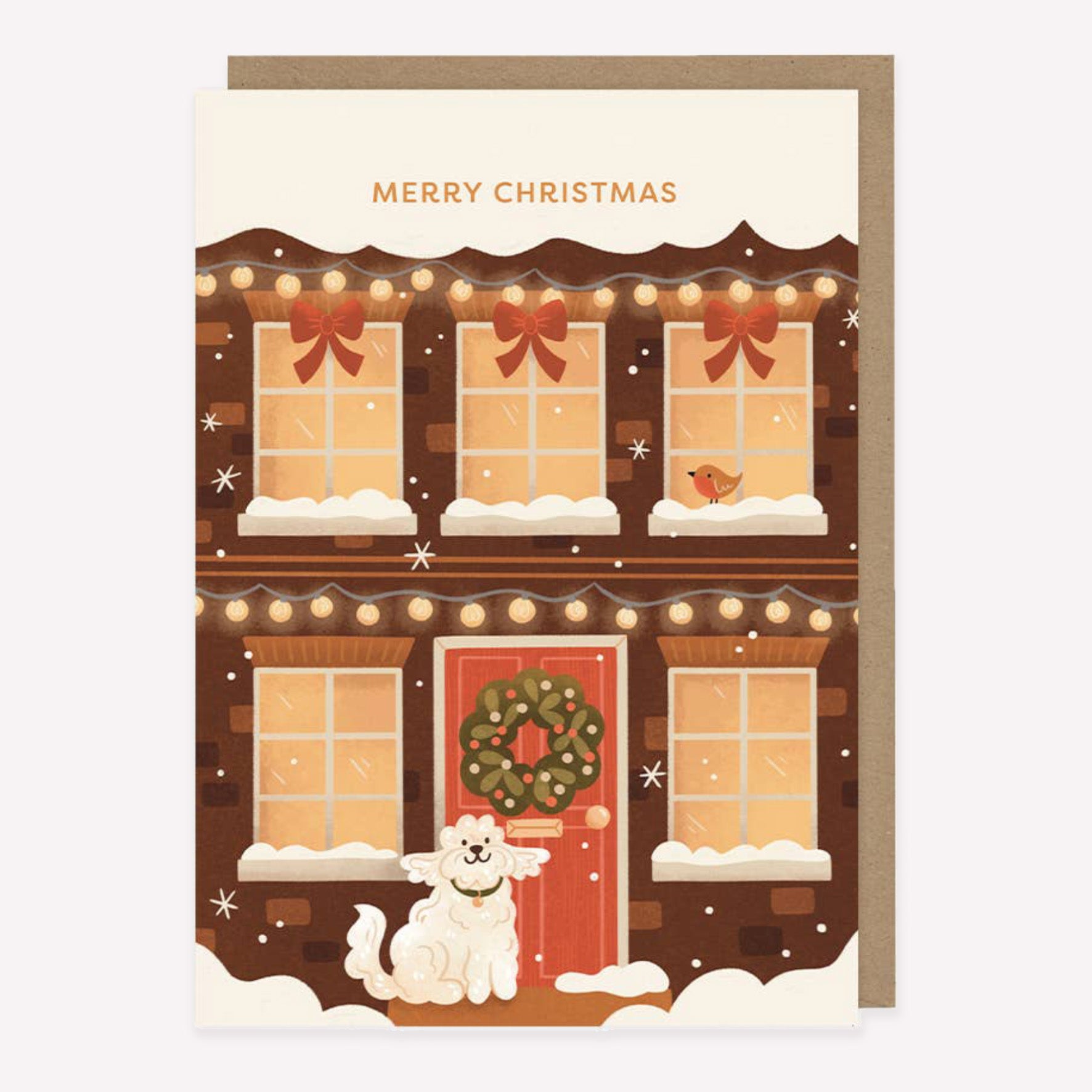 Illustrated Christmas card featuring a snowy house with a dog sitting by the door, and 'Merry Christmas' text.