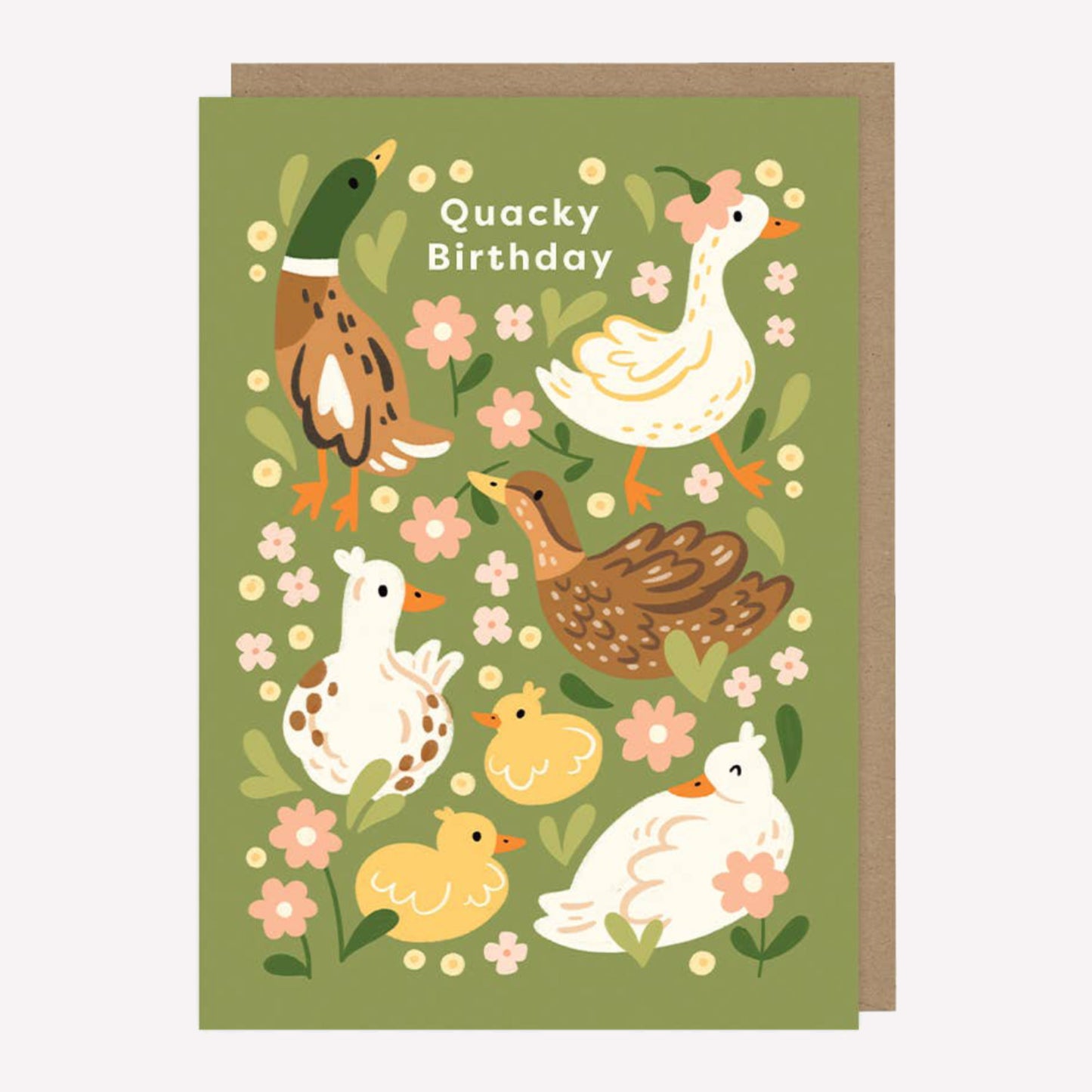Illustrated greetings card featuring ducks and flowers on a green background with text reading "Quacky Birthday". 