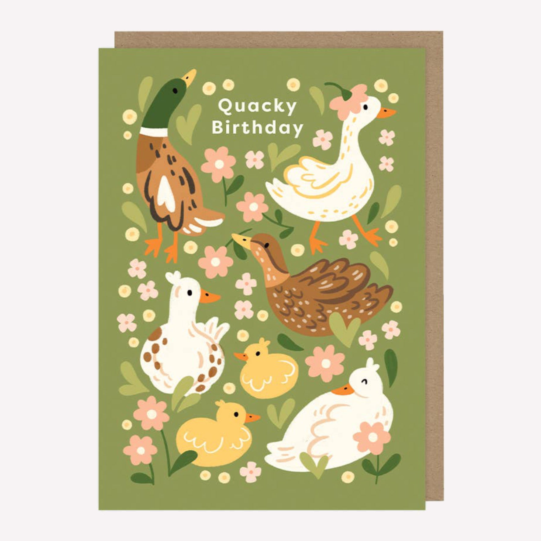 Illustrated greetings card featuring ducks and flowers on a green background with text reading "Quacky Birthday". 