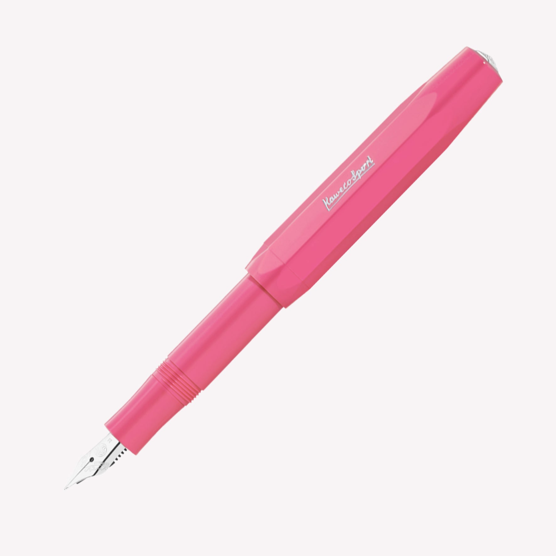 Kaweco Skyline Sport fountain pen with a bright pink barrel and a fine silver nib. 