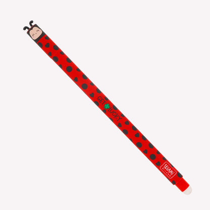 Ladybug Legami erasable gel pen with a face and bug antennae on the lid. The barrel of the red pen is patterned with black spots and hearts, and printed with the text "get lucky".