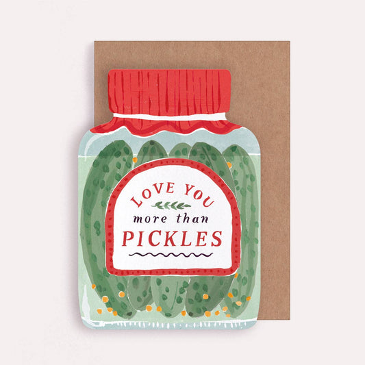 An illustrated Valentines greetings card by Sister Paper Co in the shape of a jar of pickles, with text that reads "Love You More Than Pickles".