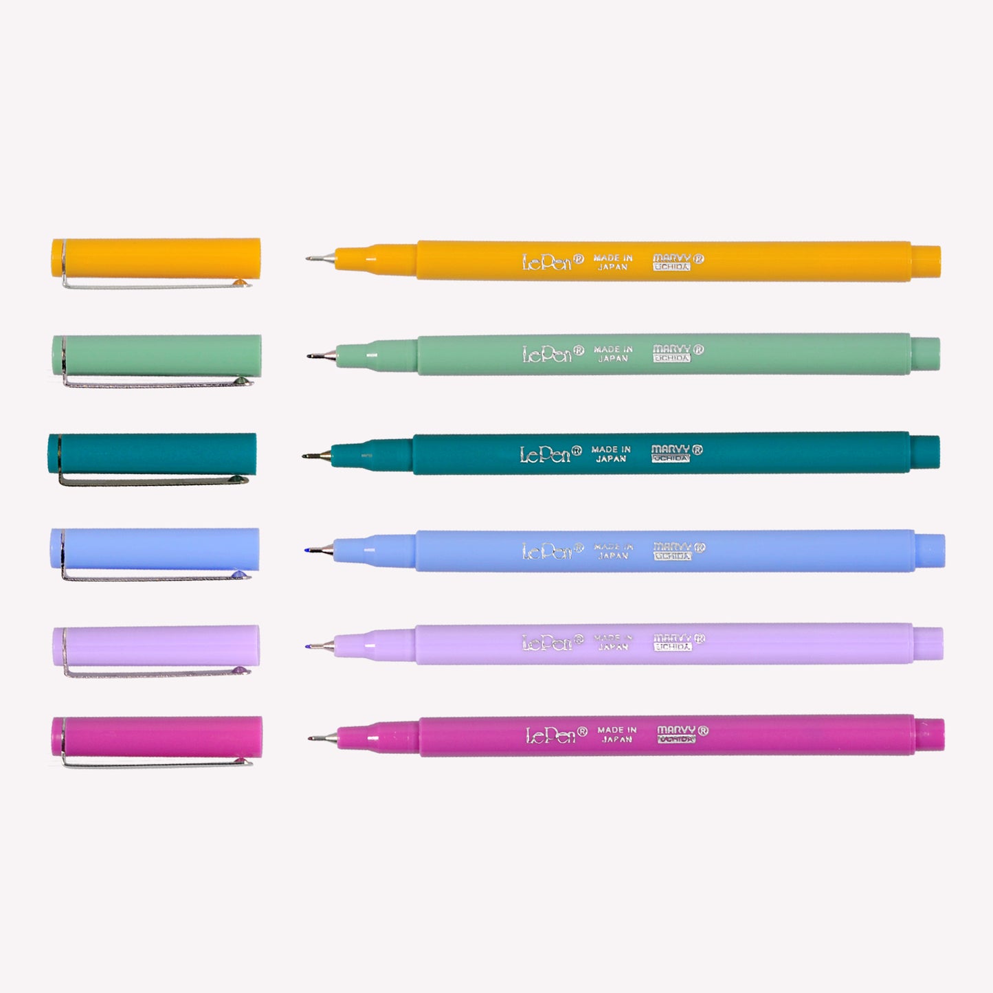 Six Le Pen fineliners by Marvy Uchida in colours Mustard, Jade Green, Teal, Periwinkle Blue, Wisteria and Magenta.