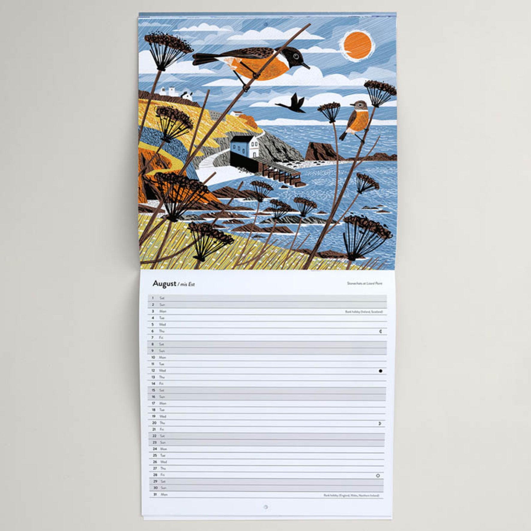 Inside Matt Johnson's ‘Lizard & Helford Birds' Cornwall wall calendar for 2026. The calendar is opened on August, with a full illustration of a Stonechats at Lizard Point at the top and the dates of the month below.