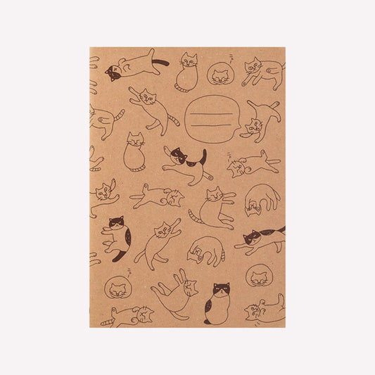 Kraft cover A5 notebook with a hand drawn pattern of cats sleeping, stretching and curled up. Made by Midori. 