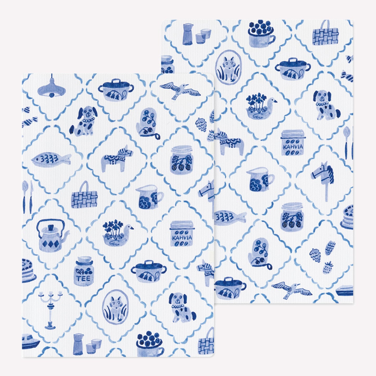 Front and back covers of the Midori Blue Nordic Yuru Log notebook featuring a blue and white brush pen style pattern of scandinavian motifs. 
