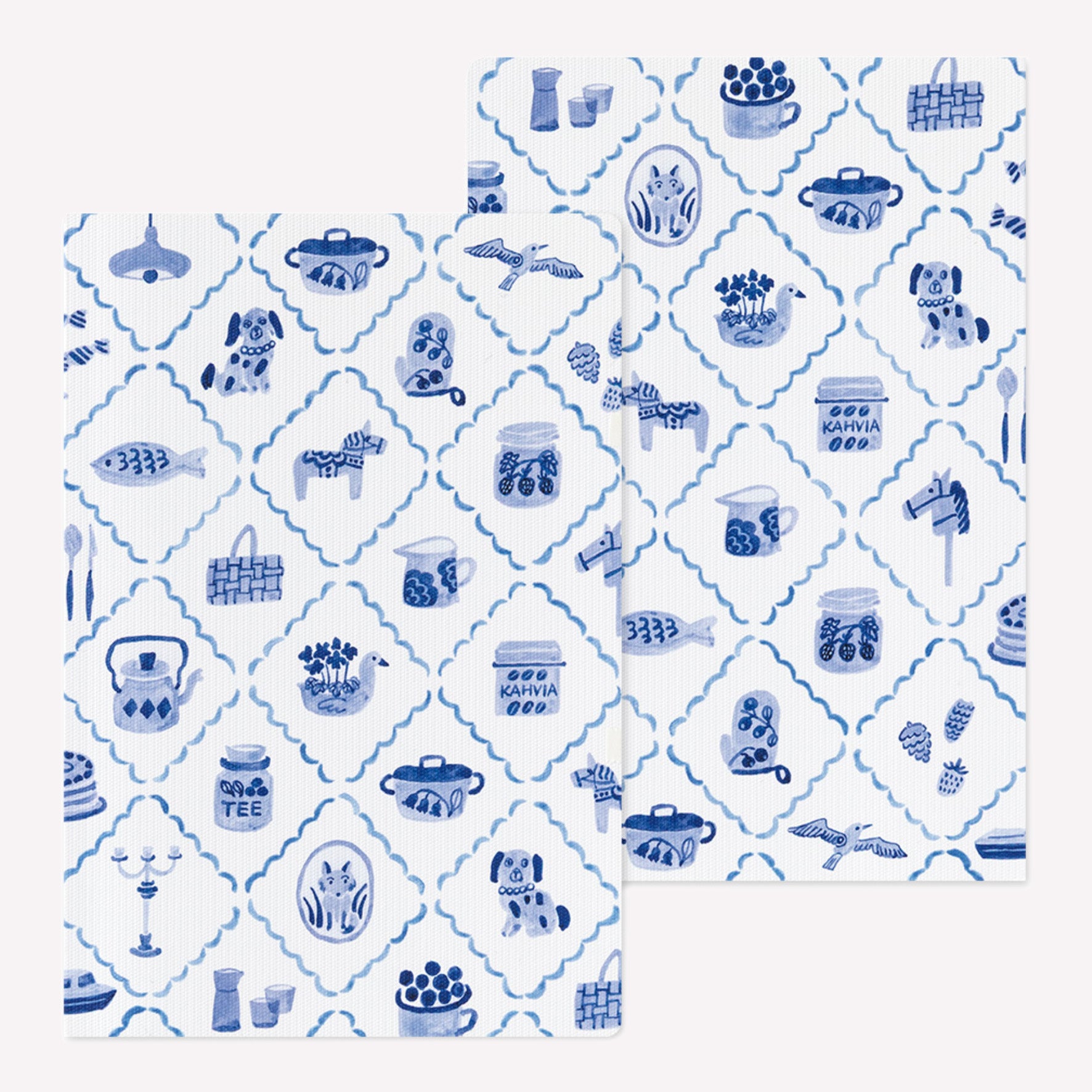 Front and back covers of the Midori Blue Nordic Yuru Log notebook featuring a blue and white brush pen style pattern of scandinavian motifs. 