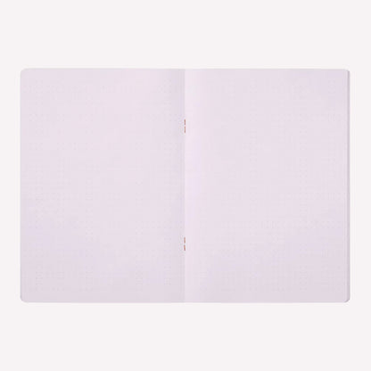 Inside the Midori soft cover stapled notebook. Dot grid pages are a pale purple with a 5mm spacing. 