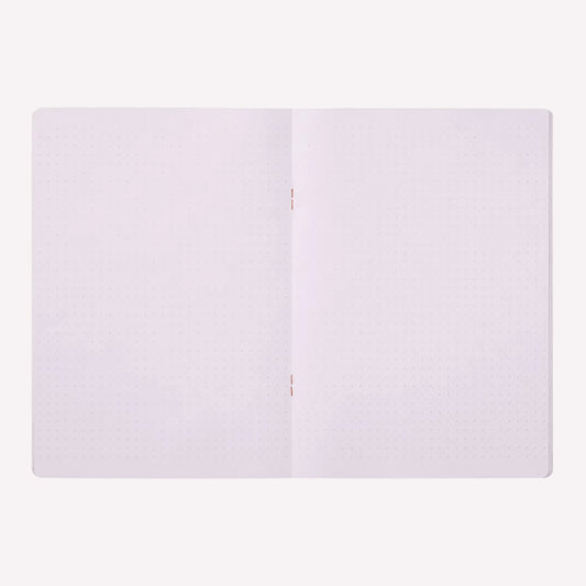 Inside the Midori soft cover stapled notebook. Dot grid pages are a pale purple with a 5mm spacing. 