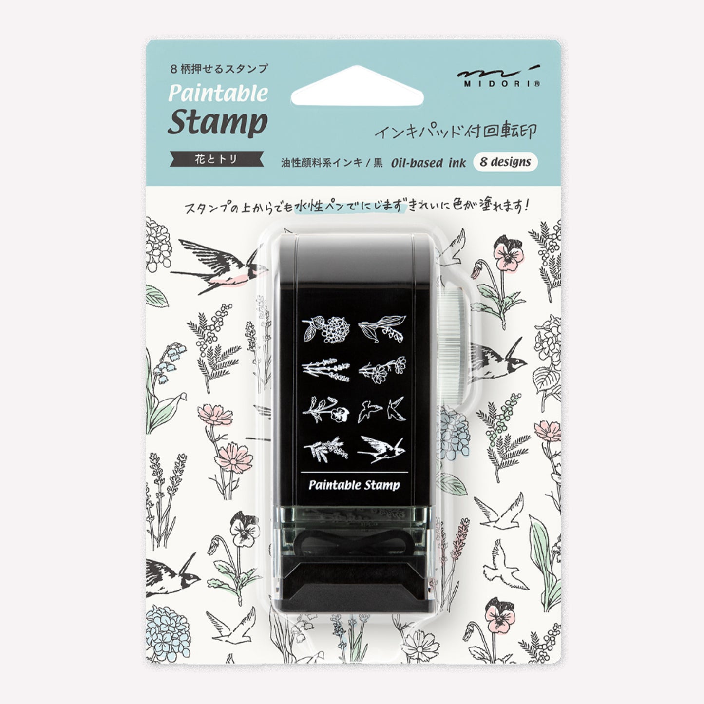 Midori paintable rotating stamp with 8 different designs themed around bird and flower illustrations presented in packaging to show the designs. 