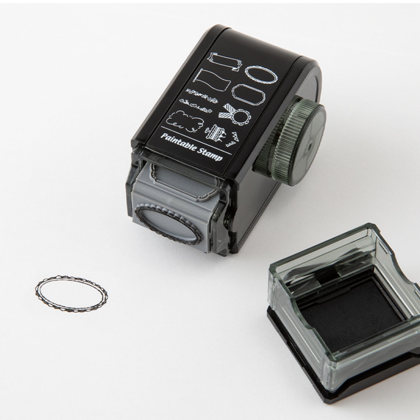Midori Antique rotating paintable ink stamp with 8 designs of decorative frames. 