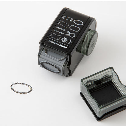 Midori Antique rotating paintable ink stamp with 8 designs of decorative frames. 