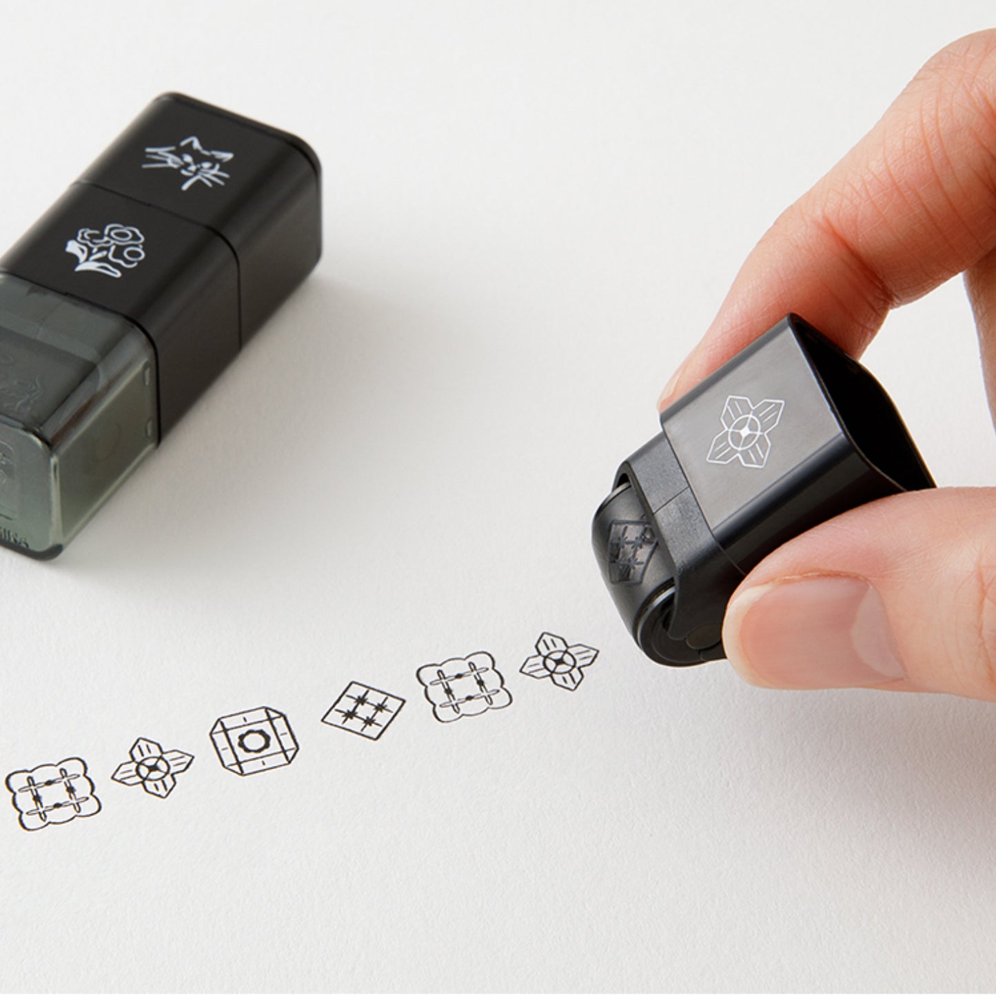 Set of 3 Midori paintable ink roller stamp, featuring dog, floral and building skyline designs. 