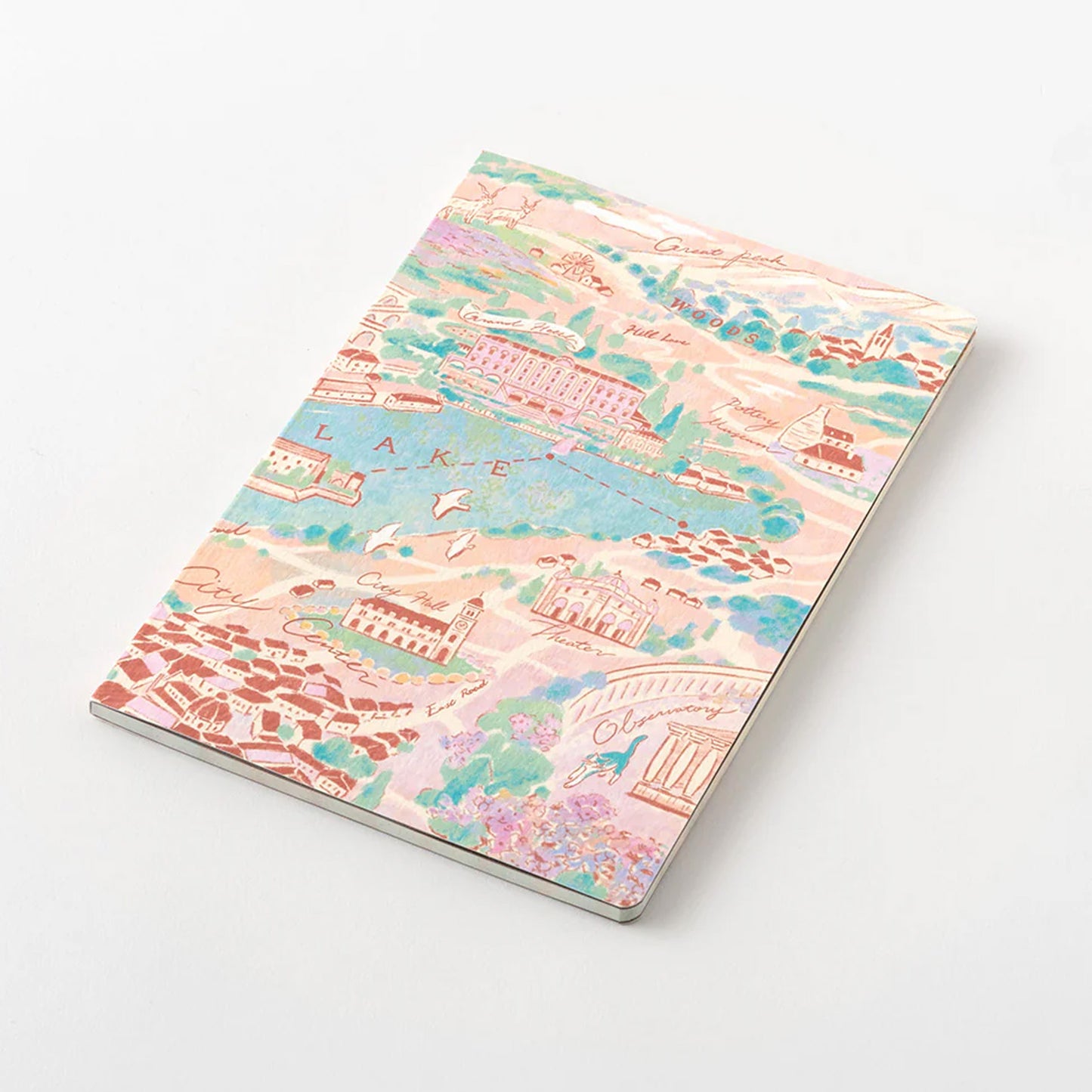 Midori Travel and Hotel Yuru Log notebook featuring a vintage style illustrated map design lying on a white surface. 