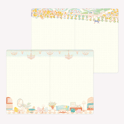 Inside the Midori Travel and Hotel Yuru Log. Dot grid pages feature decorative borders with illustrated scenes including a hotel lobby and garden view from a balcony. 