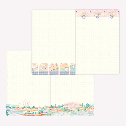 Inside the Midori Travel and Hotel Yuru Log. Dot grid pages feature decorative borders with illustrated scenes including a hotel swimming pool and riverside view. 