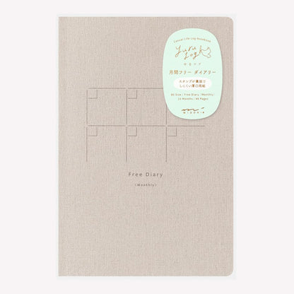 Midori Yuru Log Free Diary Monthly featuring a beige, linen style cover. 