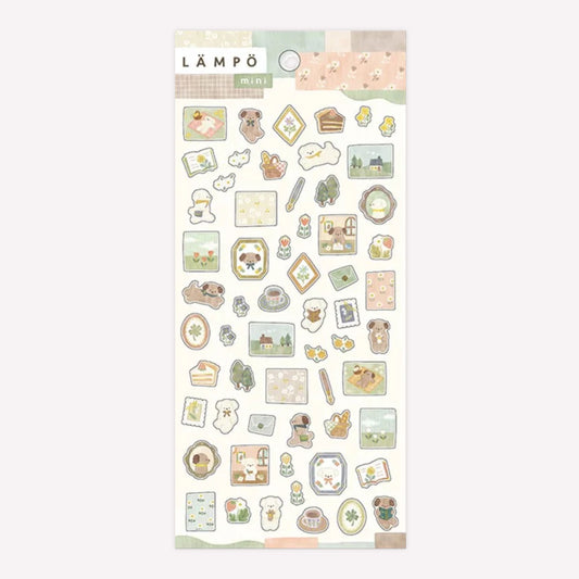 Mind Wave Lämpö sheet of decorative stickers featuring mini designs of dogs writing and reading with floral details. 